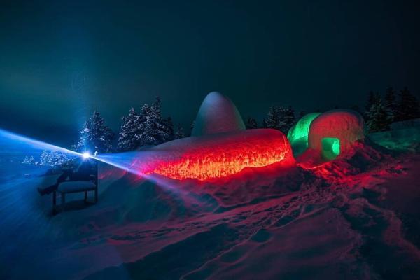 Look inside the ice igloo with a specific trait of light conductivity.