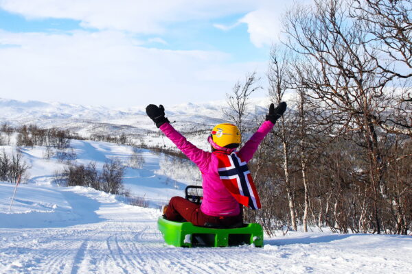 Best outdoor adventure winter in Norway Fast snow sledding in Dagali
